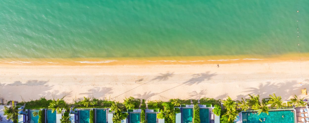 Aerial view of beautiful tropical beach and sea with palm and other tree in koh samui island for travel and vacation